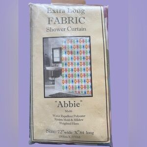 Extra long shower curtain. New in package “Abbie” flower design.